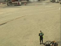 As the duo sat on flight BA 16  in Sydney, they saw said bike loaded