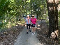 And the sisters take a walk beside the Queensland beach at Noosa.
