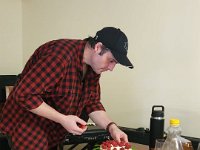 Meanwhile in Brisbane Nick decorates the cake his Auntie Olga made for Nick's grandma Margaret's 90th birthday party (her birthday was on the 10th)