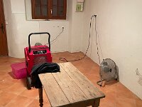 The basement (la Cave) still had to dry out more before painting was possible. The insurers sent an outfit with 4 large fans and an industrial dehumidifier that complimented the one Paulie & Stephen had.