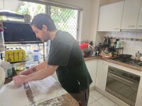 Back in Brisbane Nick prepares a meal at his Toowong apartment before moving back to rent space downstairs at mother Elizabeth's