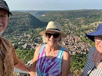 The guys showed Helen the village from the cliffs