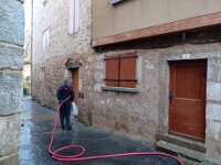The outside of La Cachette got a hose down by the pompier, but the inside was left in it's post-flood state.