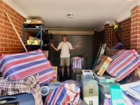 26th - Stephen put the warehouse shelves together to make storage easier.