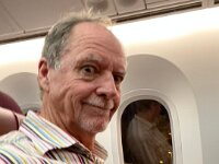 By keeping an eye online at the seating on the flight, Stephen spotted an empty row and quickly booked it just before check in closed. Very pleased with himself!