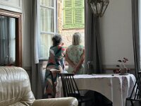 In St Antonin Yolande asked Stephen and Paulie to dinner. The gals check if this very hot day had cooled down.